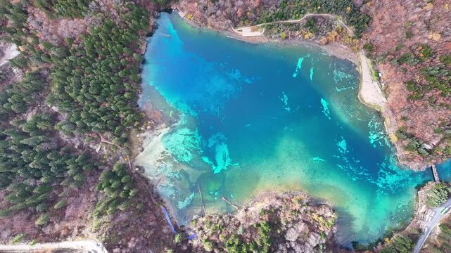 Aerial view of crystal blue lake at Sichuan Jiuzhaigou in autumn