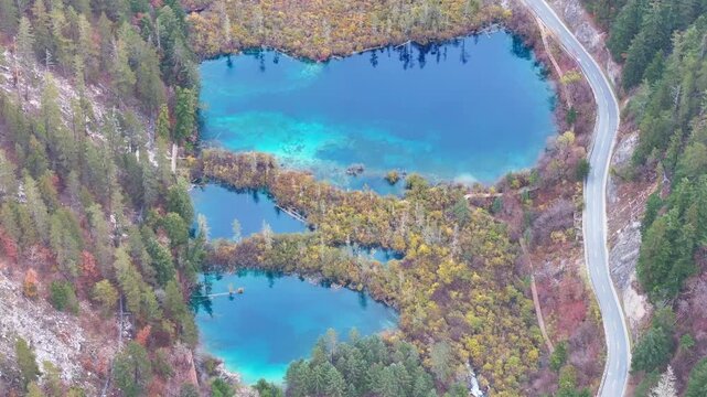 Aerial view of crystal blue lake at Sichuan Jiuzhaigou in autumn