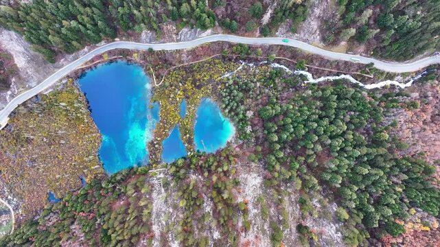 Aerial view of crystal blue lake at Sichuan Jiuzhaigou in autumn