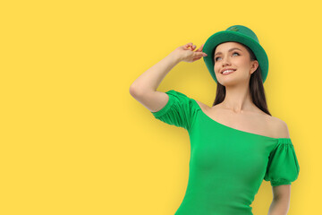 A woman with a green outfit showcases St. Patrick's Day spirit