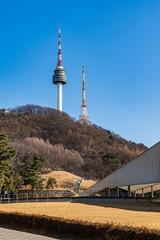 Obraz premium N Seoul Tower with autumn landscape. It is also known as Namsan Tower or Seoul Tower, the landmark which is a communication and observation tower located on Nam Mountain in central Seoul, South Korea