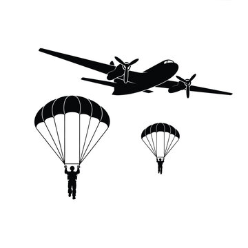 Black silhouette of an airplane with parachutists descending below