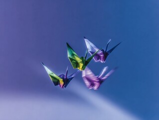 Fototapeta premium Colorful Origami Paper Birds Rising Upward Representing Business Growth and Skill Development, Conceptual Innovation and Career Progress on Purple Background with Copy Space