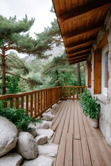 Fototapeta premium Rustic wooden chalet balcony overlooking mountain forest