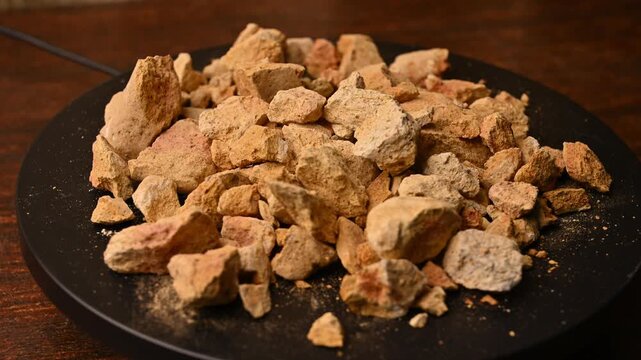 Side View of Multani Mitti (Fuller&rsquo;s Earth) Rotating on Black Background &ndash; Beauty And Skincare Rotating Footage