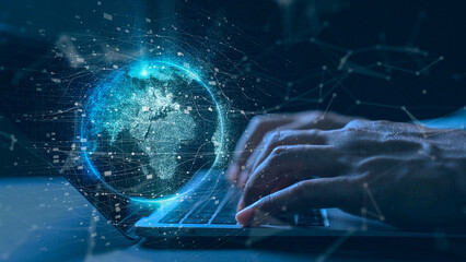 global digital hologram network businessman hands typing on a laptop with a glowing virtual. Future technology concept featuring artificial intelligence, big data analytics © Yellow Boat