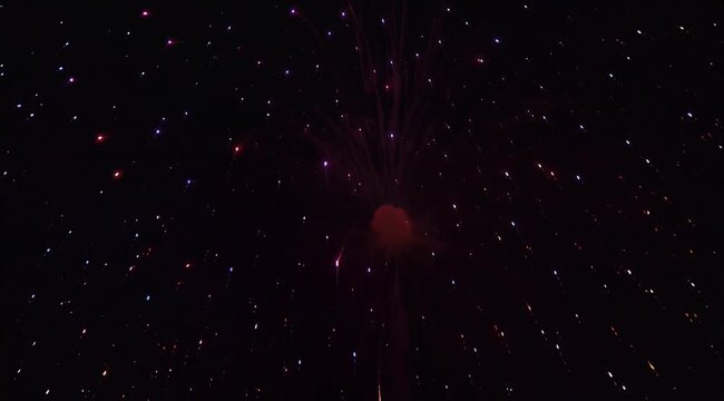 Starry night sky with distant nebula and countless twinkling stars across a vast cosmic canvas.