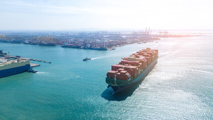 Massive container ship arriving at a busy commercial port with cranes. Global maritime logistics,...