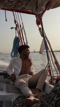Relaxing on a traditional sailboat along the Nile in Egypt
