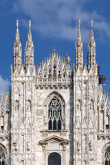 Milan Cathedral Facade in Italy - Gothic Spires and Stained Glass Windows Close Up
