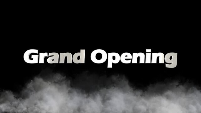 The bold white and silver metallic text "Grand Opening" is prominently displayed across a dark, smoky, and dramatic background, creating an impactful visual for marketing and promotional announcements