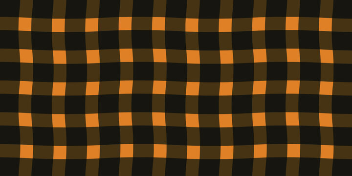 Hand drawn orange and black buffalo plaid pattern seamless textile background texture