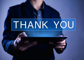 Businessman using laptop and showing thank you message. Concept of congratulation, appreciation, presentation from digital technology. Thank you in business and gratitude.