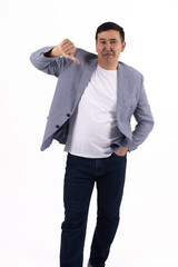 Confident man in suit looking at camera on white background