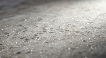 Obraz premium Gray sparkly surface with water droplets