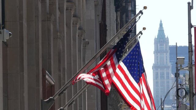 New York City Woolworth building 1913, skyscraper on Broadway in Downtown Financial District, Lower Manhattan, United States of America. Gothic historic architecture, cooper roof, USA american flag.