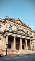 Fototapeta premium Grand neoclassical bank architecture with ornate detailing, majestic facade, vintage, neoclassical