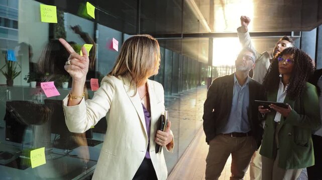 Team members actively participating in a brainstorming session, discussing ideas and strategies for successful collaboration in a dynamic business environment, fostering teamwork and creativity.