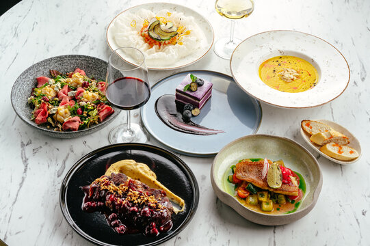 fried pike perch fillet with sauce and vegetable stew