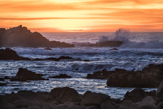 Waves Crashing During an Oceanfront Sunset in Monterey