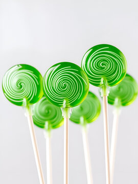 Green lolipops isolated.