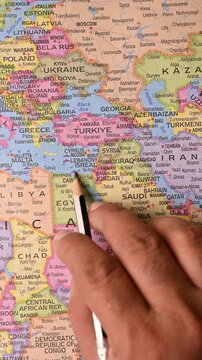 Pencil Pointing to Israel on World Map &ndash; Vertical Travel and Geography Concept Footage