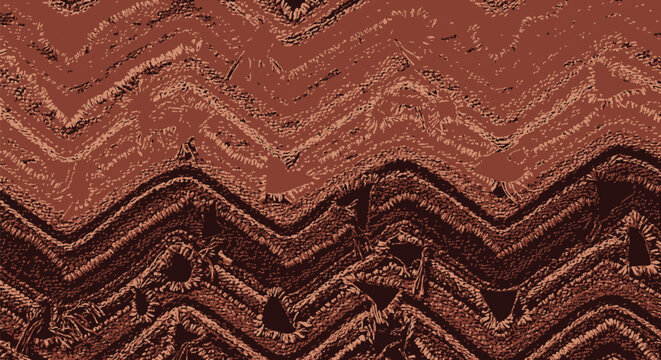 Vibrant brown chevron patterned fabric with a seamless woven texture, showcasing traditional Philippine Yakan weaving, ideal for design and cultural projects.