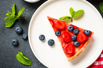 Tart with fresh berries and jelly.
