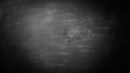 Chalk rubbed out on blackboard background.  © Sharmin