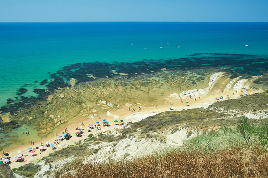 High angle view of the white marl cliffs and sandy beach at Scala dei Turchi near Realmonte, Agrigento, Sicily, Italy.