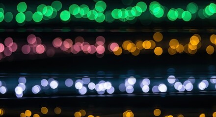 Multi-colored horizontal layered string light bokeh, dark festive celebration Concept