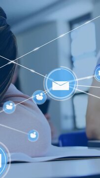 Vertical video: Pupil writing sending mail, network expanding to show class chat, peer resting