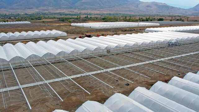 Expanding Commercial Greenhouse Farm &ndash; Aerial Drone View of Modern Agriculture