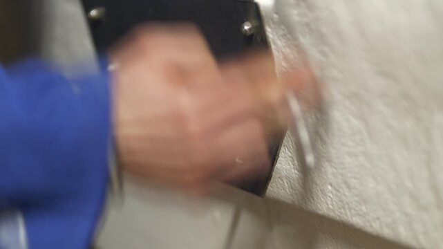 Tightening nyloc nut using ratcheting spanner