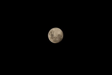 Detailed full moon isolated against black night sky © Sean