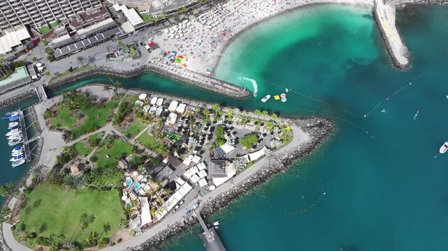 Aerial view of Playa Anfi del Mar and Isla Corazon de Anfi, Gran Canaria, Canary Islands, Spain