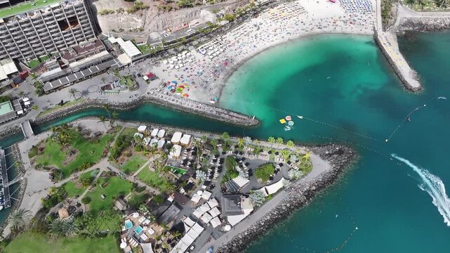 Aerial view of Playa Anfi del Mar and Isla Corazon de Anfi, Gran Canaria, Canary Islands, Spain