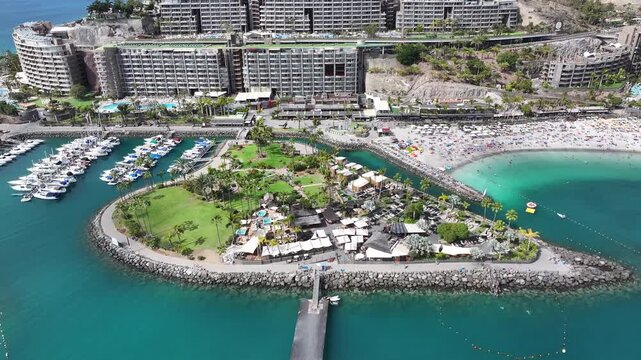 Aerial view of Playa Anfi del Mar and Isla Corazon de Anfi, Gran Canaria, Canary Islands, Spain