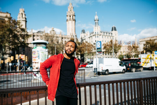 Young man in the city looking around