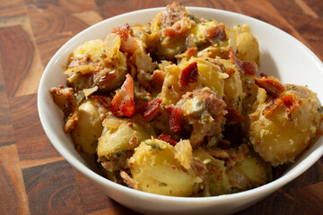 A view of a bowl of German potato salad.