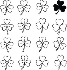 Obraz premium Black and white clover illustrations with one filled clover