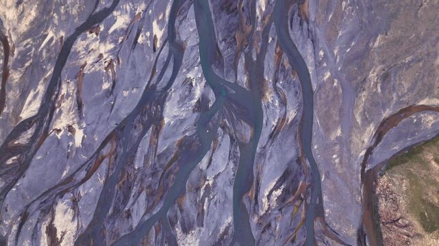 Aerial view over turquoise Kel-Suu Lake in rocky canyon cliffs, Kok-Kiya Valley, Kyrgyzstan