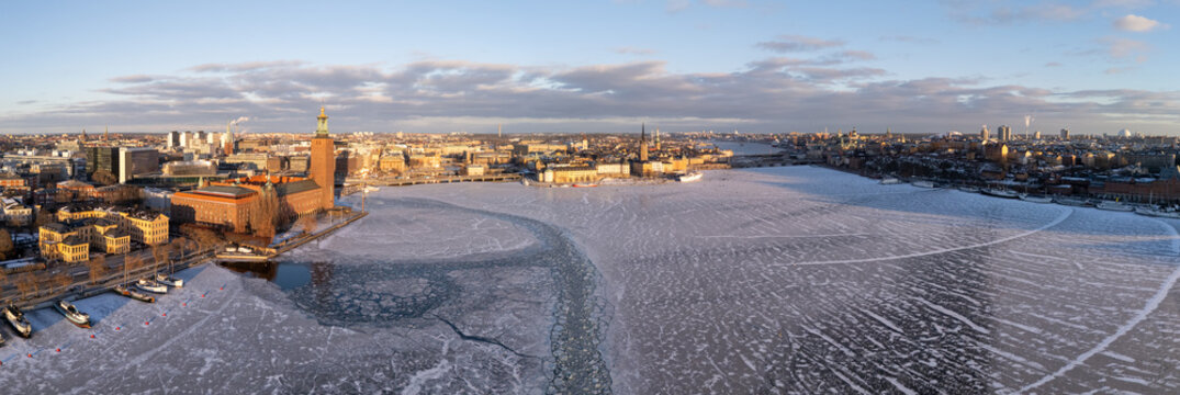 Aerial view of Stockholm City Hall standing majestically against the crisp, icy waters of Norr Malarstrand, Stockholm, Stockholms lan, Sweden.