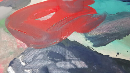 Abstract colorful strokes of red, blue, and white paint on canvas. Modern art texture with brush marks and creative design concept.