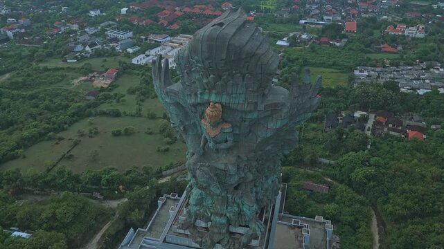 Aerial drone flying over garuda wisnu kencana statue in bali