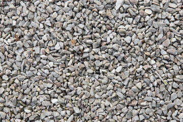 Fototapeta premium Echantillon texturé de graviers posés au sol, format paysage