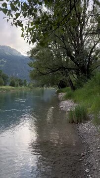 Linth river water stream Glarus canton Switzerland nature outdoor vertical video format