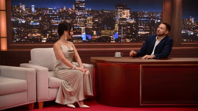Edited Montage of Late Night Talk Show Interview: White Male Host Chats With White Female Guest, Having Evening Fun. Entertainment Concept. Mockup Broadcasting Playback, TV Screen Replacement.