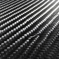 Fototapeta premium Macro shot of a carbon fiber weave texture, showing the intricate pattern of black and silver threads, isolated on transparent background.