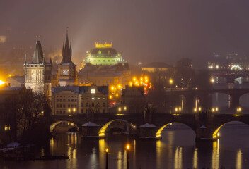 Fototapeta premium Winter view on national heatre in Prague (Czech Republic) Snow in roof